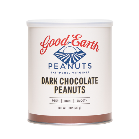 A white cylindrical canister of Good Earth Peanuts Dark Chocolate Peanuts, featuring a white lid and a label with red and blue branding, set against a plain white background.