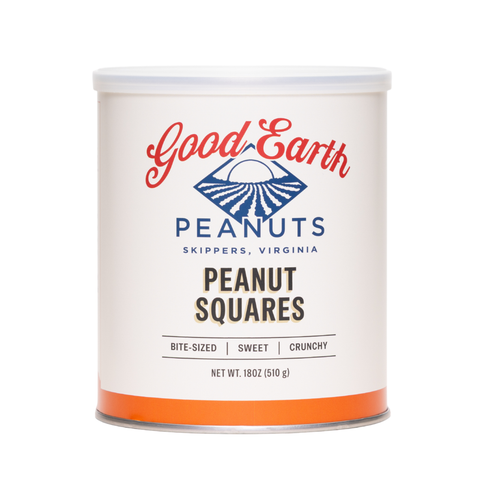 A white cylindrical canister of Good Earth Peanuts Peanut Squares, featuring a white lid and a label with red, blue, and black text, set against a plain white background.