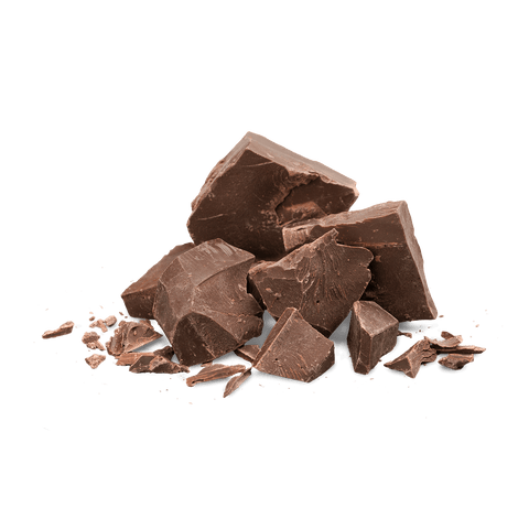 Chopped chocolate pieces on a black background