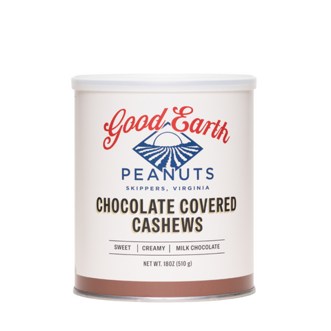 A canister of Good Earth Peanuts Chocolate Covered Cashews on a solid white background. The canister is off-white with a white lid, featuring red and blue branding and black text.