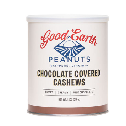 A canister of Good Earth Peanuts Chocolate Covered Cashews on a solid white background. The canister is off-white with a white lid, featuring red and blue branding and black text.