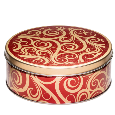 A round metal tin with a lid, decorated with a red and gold swirling pattern, shown on a plain white background.