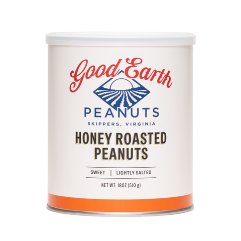A white cylindrical canister of Good Earth Honey Roasted Peanuts, featuring a white label with red and blue branding and an orange band at the bottom, set against a plain white background.